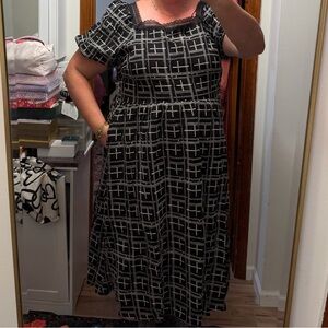 Elegant Black and White Embroidered Midi Dress with lace trim